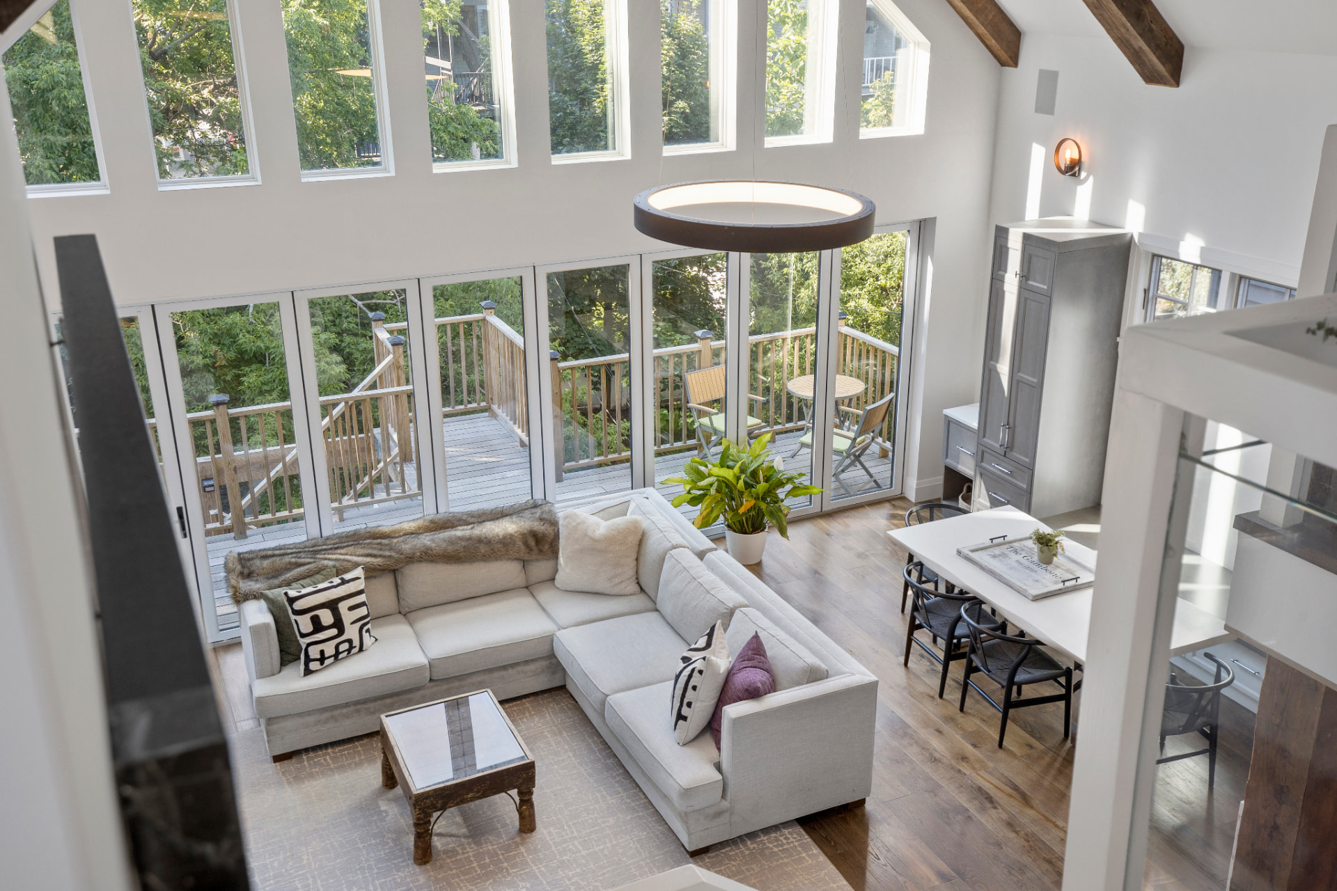 Overhead view of the penthouse living and dining area after painting